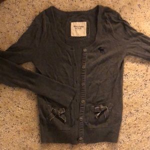 Gray sweater with bows